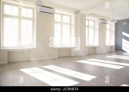 Empty light white room with window with sunlight. Stock Photo