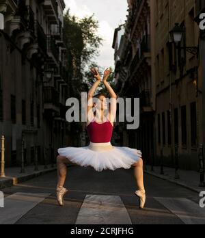 Ballerina shooting in the streets of Madrid when sunset is coming Stock Photo