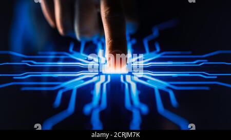 Digitalization Concept: Human Finger Pushes Touch Screen Button and Activates Futuristic Artificial Intelligence. Visualization of Machine Learning Stock Photo