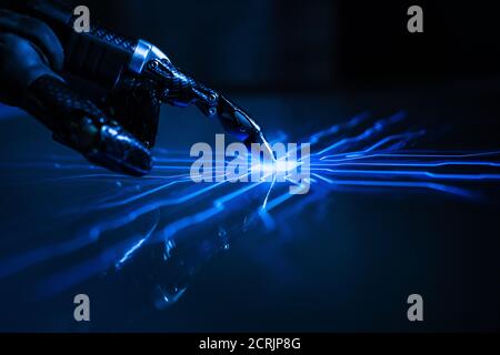 Digitalization Concept: Futuristic Robot Arm Interacting with Screen, Finger Touches Display and Activates Artificial Intelligence. Visualization of Stock Photo