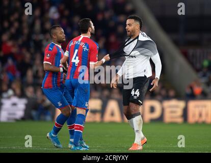 Luka Milivojevic clashes with Tom Huddlestone and is then sent off after referee Michael Oliver consulted the pitchside VAR screen   PHOTO CREDIT : © Stock Photo