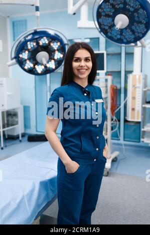 Smiling female surgeon in operating room Stock Photo