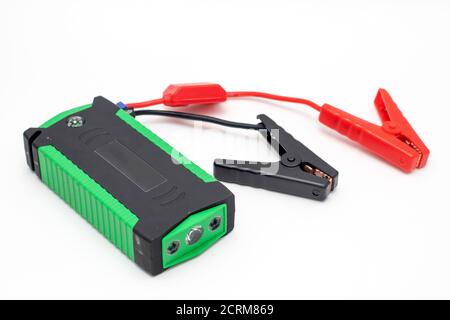 Portable car jump starter isolated on white background. Emergency charger booster Power Bank battery Stock Photo