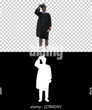 Excited african american male student throwing mortarboard in th Stock Photo