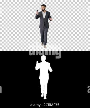 Businessman walking and making a video call, Alpha Channel with Stock Photo