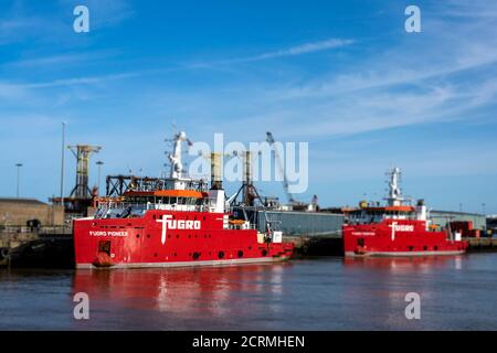 Fugro Pioneer & Frontier offshore energy supply ships, port of Great Yarmouth, Norfolk, UK. Stock Photo