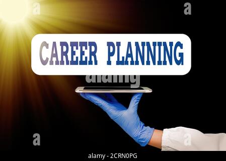 Text sign showing Career Planning. Business photo showcasing Strategically plan your career goals and work success Displaying empty sticker paper acce Stock Photo