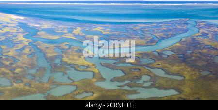 Salt marshes and estuaries are found throughout Cape Cod, Massachusetts. They provide calm nesting, feeding and breeding habitat for many species. Stock Photo