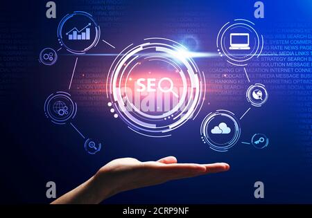 Female Hand Holding Seo-Optimization Scheme For Web Content, Blue Background Stock Photo