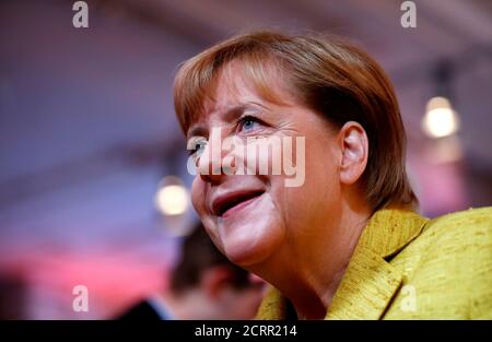 German Chancellor Angela Merkel attends a breakfast with supporters at the Christian Democratic Union (CDU) party election campaign meeting centre in Berlin, Germany, September 23, 2017.    REUTERS/Fabrizio Bensch