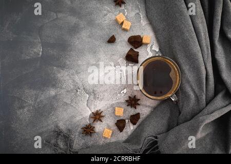 Composition with coffee cup, sugar and dark chocolate on gray background. Flat lay, top view Stock Photo