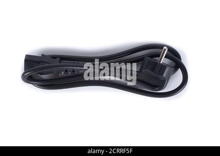 Black power cord isolated on white background. Standard 3 pin power cord for computer, monitors, household appliances. Stock Photo