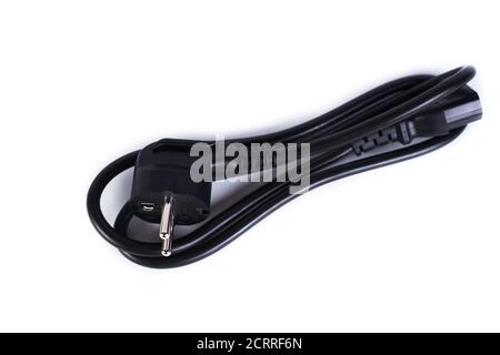 Black power cord isolated on white background. Standard 3 pin power cord for computer, monitors, household appliances. Stock Photo