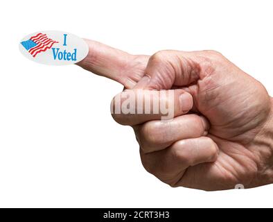 Senior mans hand with I voted sticker on finger as he makes a fist to show a firm voter in presidential election Stock Photo