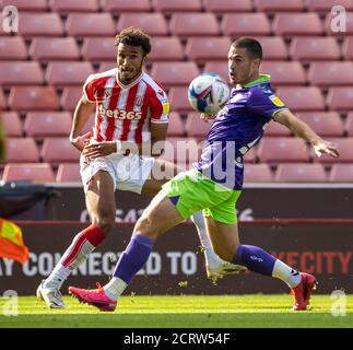 Stoke, Staffordshire, UK. 20th Sep, 2020. 20th September 2020; Bet365 Stadium, Stoke, Staffordshire, England; EFL Championship Football, Stoke City versus Bristol City; Jacob Brown of Stoke City crosses the ball under pressure Credit: Action Plus Sports Images/Alamy Live News Stock Photo