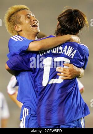 Japan S Junichi Inamoto R Celebrates With His Team Mates Naoki Matsuda Atsushi Yanagisawa L And Hidetoshi Nakata 2ndl After Scoring A Goal Against Russia During Their Group H Match At The World