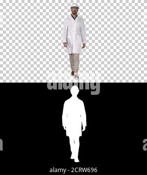 Science engineer walking in safety helmet and glasses, Alpha Cha Stock Photo