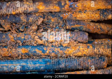 Old metal studs covered in rust, close-up, selective focus Stock Photo