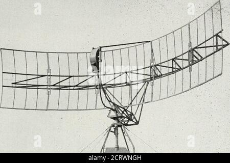 . The Bell System technical journal . «rV RADAR ANTENNAS 311 The objective was to obtain as long range early warning as possible withmoderate accurracy of location. Emphasis was placed on detection of lowflying planes. The objectives for the set indicated that the antenna should be builtas large as reasonable and placed as high as reasonable for a portable set.Some latitude in choice of frequency was permitted at first. For rugged-ness and reliability reasons which seemed controlling at the time, the fre-quency was pushed as high as possible with vacuum tube detectors andR.F. amplifiers. This Stock Photo