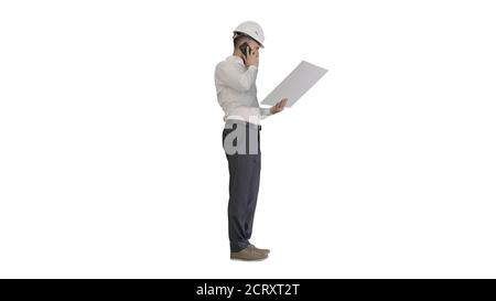 Engineer in formalwear and hardhat talking to client or contract Stock Photo