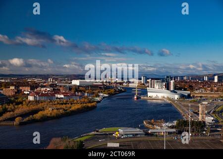 Glasgow/Scotland-Nov 13, 2013: Fall in the city. Clyde river embankment. Riverside Museum and The Tall Ship at Riverside. Panorama view. Yellow trees. Stock Photo