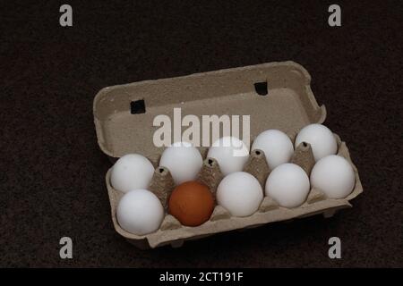 Multi-colored eggs in a package. Organic Eggs from Free Range Chickens. Eggs Of Different Colors From White To Brown Together In A Crate Stock Photo