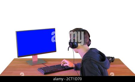 Gamer talking about the game on the screen to camera on white ba Stock Photo