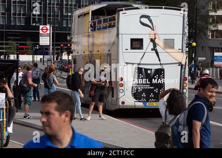 An ad for the luxury fashion and accesssory brand Isabel Marant, is on the rear and side panels of a London tour bus with the Golden Tours company and part of campaign to be seen in front of the public across the capital, on 19th September 2020, in London, England. Stock Photo