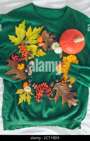 orange and green sweater