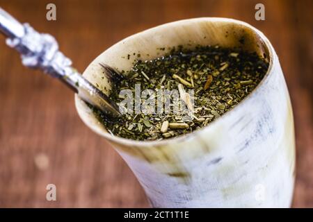 Tereré ou tererê is a typical South American drink made with the infusion of yerba mate in cold water. Of Guarani origin, it can be consumed with lemo Stock Photo