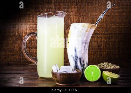 Tereré ou tererê is a typical South American drink made with the infusion of yerba mate in cold water. Of Guarani origin, it can be consumed with lemo Stock Photo