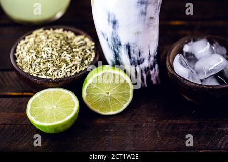 Tereré ou tererê is a typical South American drink made with the infusion of yerba mate in cold water. Of Guarani origin, it can be consumed with lemo Stock Photo