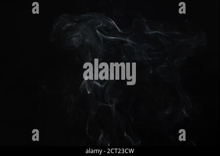 Beautiful smoke abstract on black background. Background from the smoke of vape Stock Photo