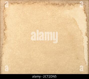 Used stained paper sheet. Old cardboard background Stock Photo