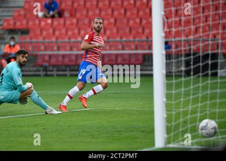 Granada Cf player Roberto Soldado scores the opening goal during the La Liga match between Granada CF and Deportivo Alaves at Nuevo los Carmenes stadium.(Final score; Granada CF 2:1 deportivo alaves) Stock Photo