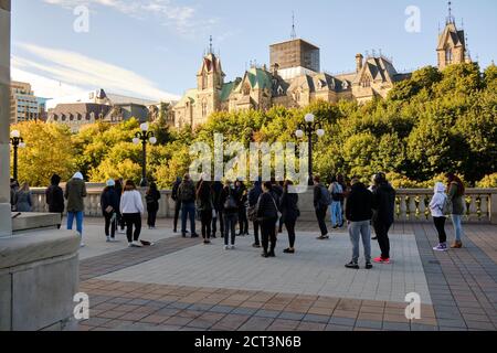 Ottawa, Canada. September 18, 2020. Group of 35 people gathered outside parliament early in morning. The numbers seem to exceed new rules put in place Stock Photo