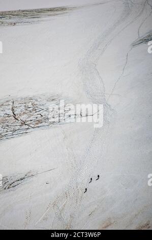 Climbers descending Glaciar de los Tres, returning from Mount Fitz Roy (aka Cerro Chalten), El Chalten, Patagonia, Argentina, South America Stock Photo