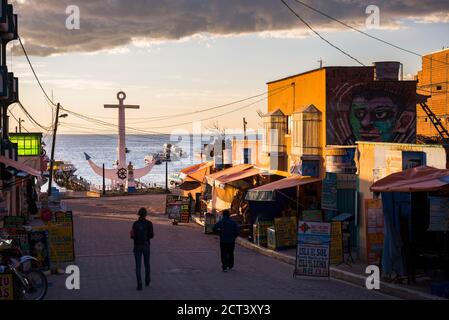 Anchor at sunset and Avenida 6 de Agosto (6 August Street), Copacabana, Bolivia, South America Stock Photo