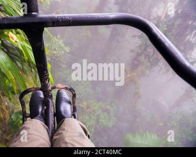 Ecuador. Mashpi Lodge Sky Bike on a misty morning in the Choco Rainforest, an area of Cloud Forest in the Pichincha Province of Ecuador, South America Stock Photo