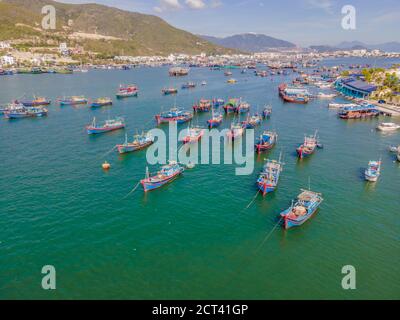 Vietnamese boats on the river. River pollution Stock Photo