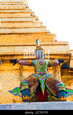Close-up of the statue of a guardian at the Grand Palace in Bangkok ...