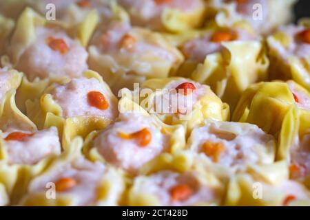 Shumai is a type of traditional Chinese dumpling, originating from Hohhot. In Cantonese cuisine, it is usually served as a dim sum snack. In addition Stock Photo