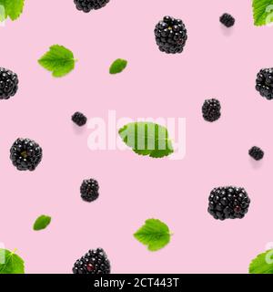 Falling Bramble Seamless pattern. Fresh Falling blackberry seamless pattern. Pattern with fresh wild berries isolated on pink background. Stock Photo