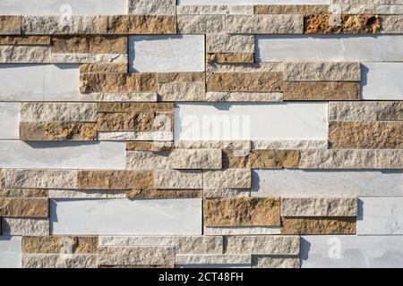 Stone wall brick texture background beige and white surface facade. Close - up. Hight quality photo Stock Photo