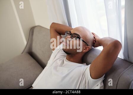Depressed young Black man Stock Photo
