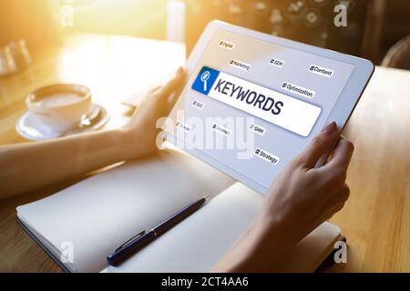 Keywords. SEO, Search engine optimization and internet marketing concept on screen Stock Photo