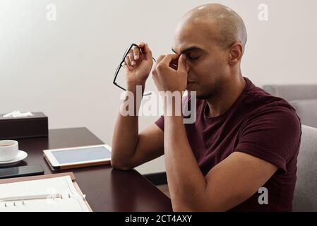Businessman feeling fatigue Stock Photo