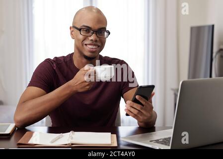 Businessman having coffee break Stock Photo