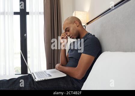 Programmer tired of coding Stock Photo