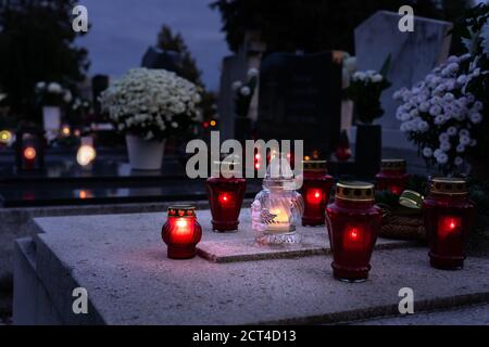 rememberance candle lanterns in the cemetery on all saints day Stock Photo